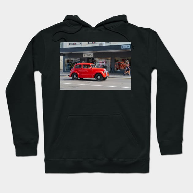 Red Morris 8 car in deco city of Napier New Zealand. Hoodie by brians101